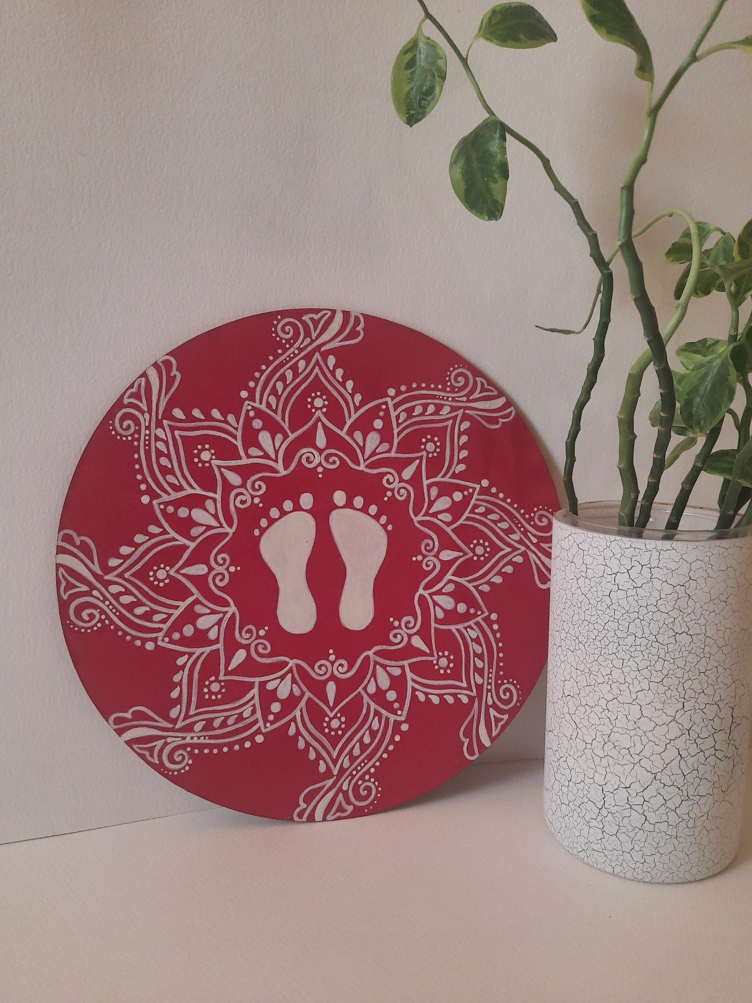 Wall plate on 10" round mdf board with traditional alpona design