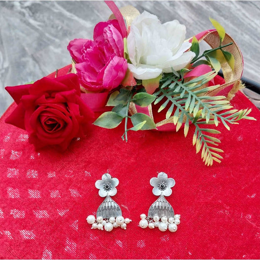 German Silver Oxidised Floral Charm Danglers Earrings gaonkasaman