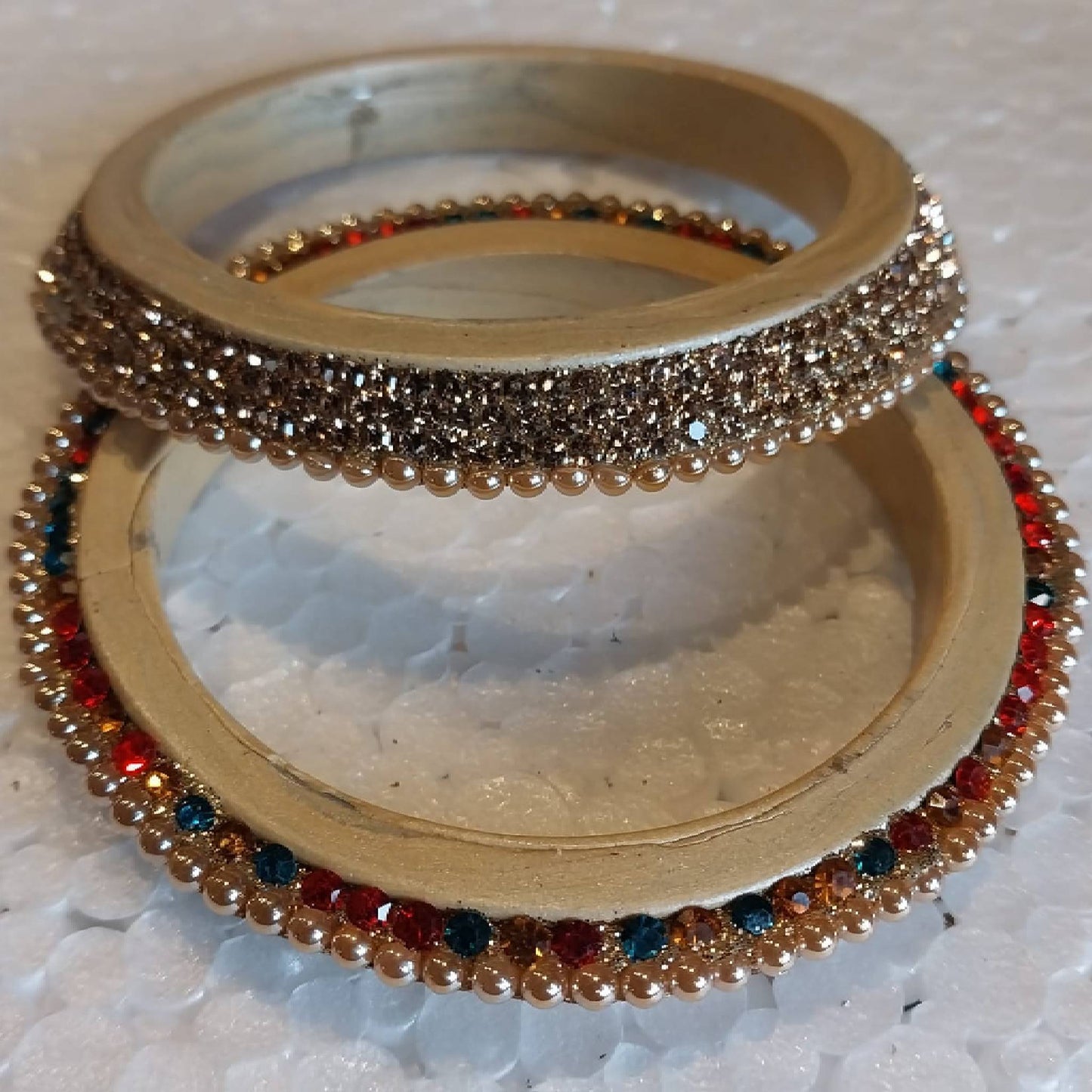 Maroon gold plated and pearl fitted lac bangri gaonkasaman